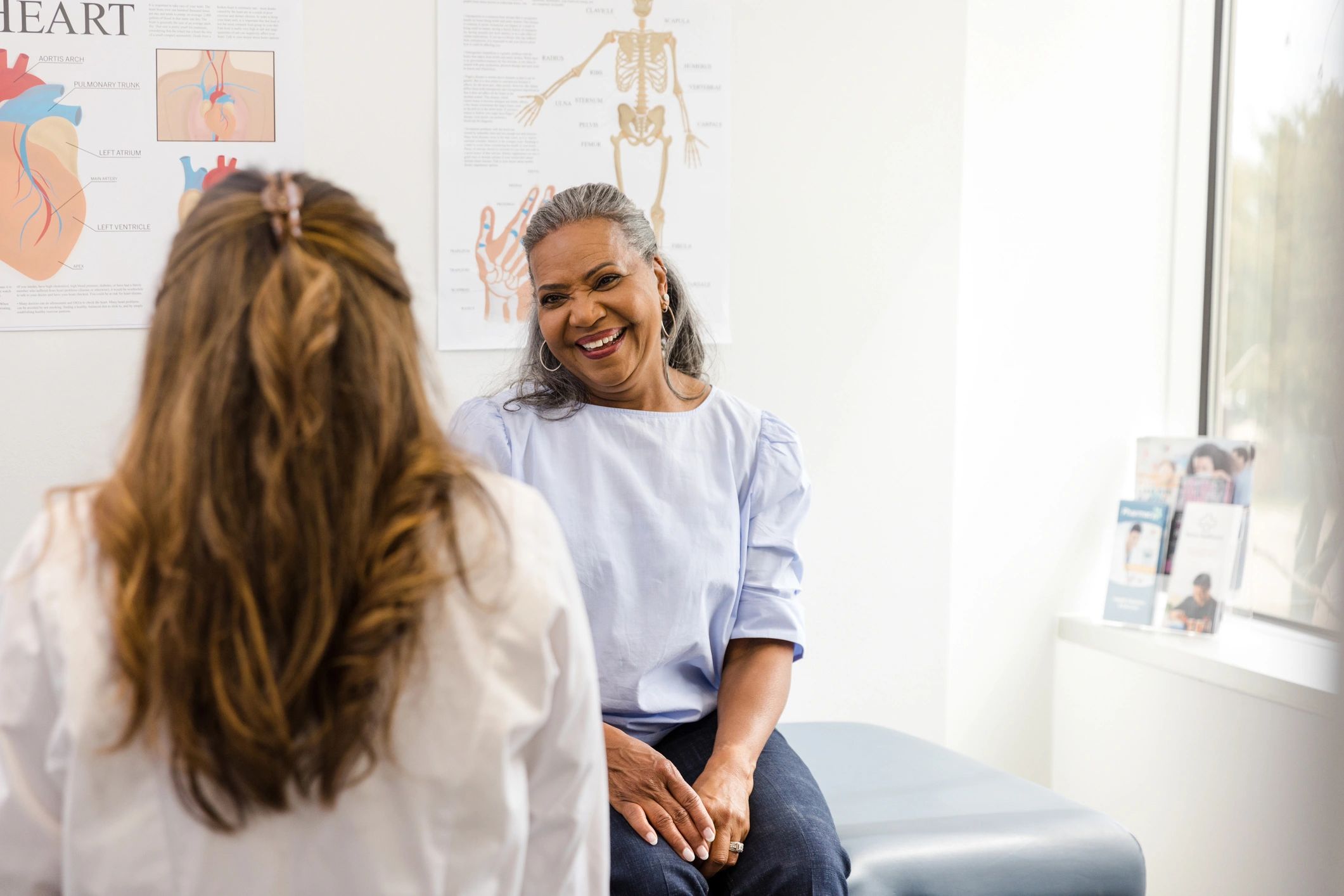 Consultation between doctor and patient in a clinic